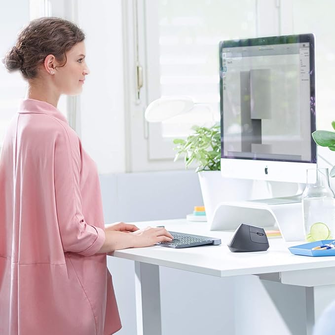 Logitech MX Vertical Wireless Mouse – Ergonomic Design Reduces Muscle Strain Move Content Between 3 Windows and Apple Computers Rechargeable Graphite