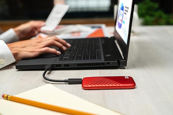 Western Digital 2TB My Passport SSD Portable External Solid State Drive Red Sturdy and Blazing Fast Password Protection with Hardware Encryption - WDBAGF0020BRD-WESN