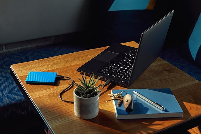 WD 4TB My Passport Portable External Hard Drive Blue backup software with defense against ransomware and password protection USB 3.1/USB 3.0 compatible - WDBPKJ0040BBL-WESN