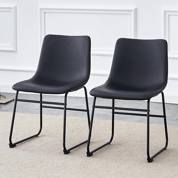 Classic Black PU Leather Chair A Stylish Seat Suitable for Modern Minimalist and Industrial Style Settings.