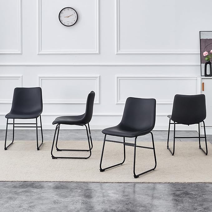 Classic Black PU Leather Chair A Stylish Seat Suitable for Modern Minimalist and Industrial Style Settings.