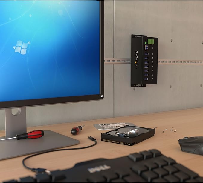 StarTech.com 7-Port USB 3.0 Hub - 5Gbps - Metal Industrial USB-A Hub with ESD Protection &amp 350W Surge Protection - Din Rail Wall or Desk Mountable - TAA Compliant USB Expander Hub (ST7300USBME)