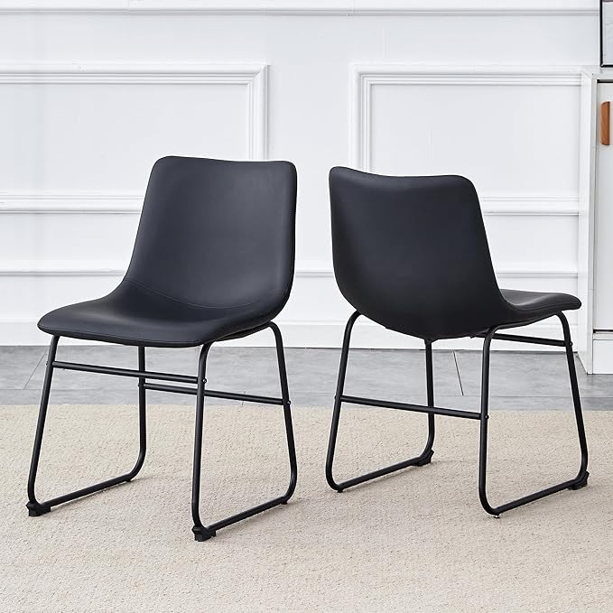 Classic Black PU Leather Chair A Stylish Seat Suitable for Modern Minimalist and Industrial Style Settings.